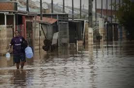 Chuvas diminuem no RS, mas frio intenso e elevação do Guaíba preocupam